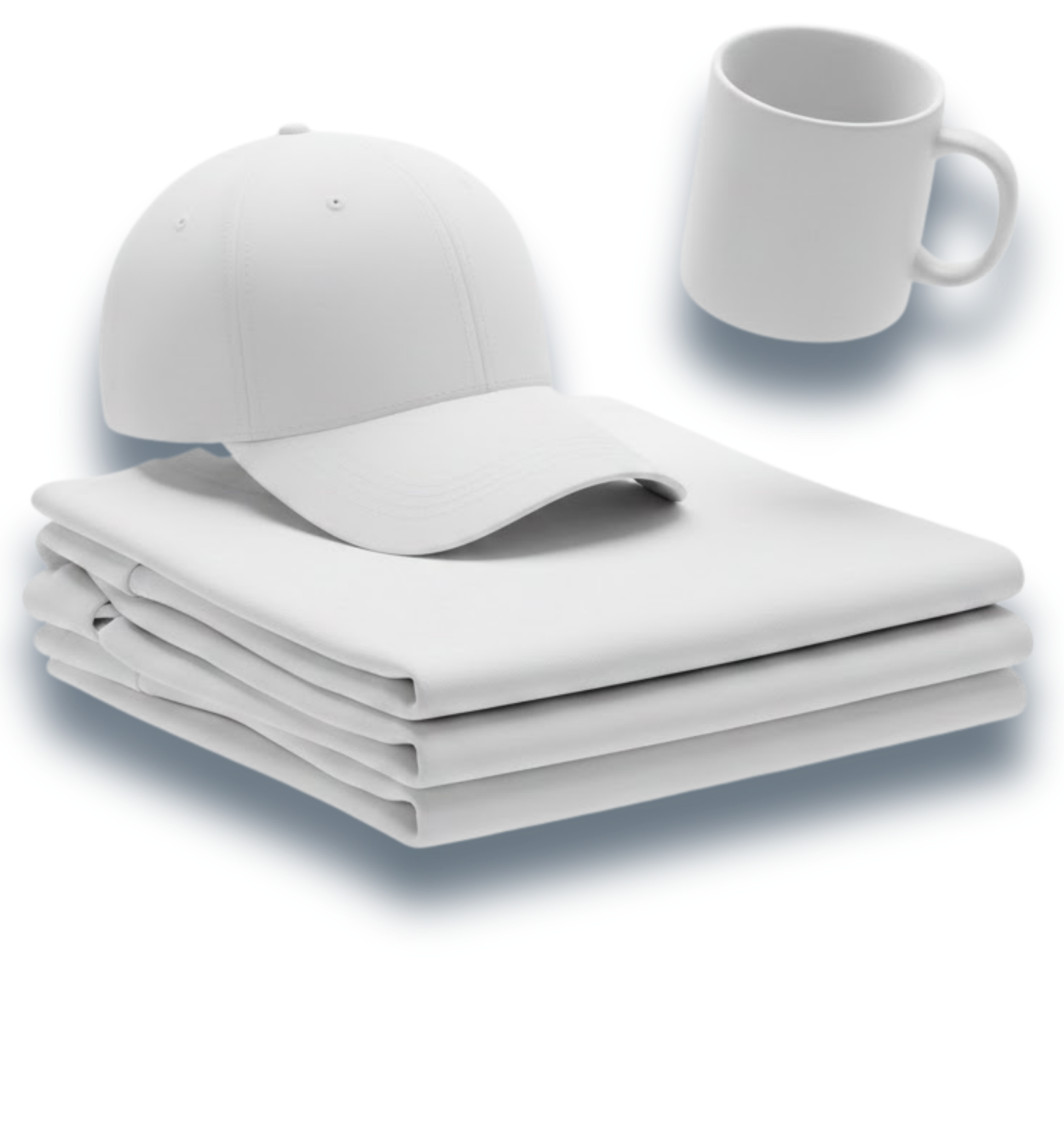 A minimalist, high-angle view of white plain stock items—a stack of folded T-shirts, a blank baseball cap, and a ceramic mug—floating against a clean white background with soft shadows.